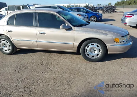 1998 Lincoln Continental z USA, uszkodzony, nr VIN 1LNFM97V7WY658487